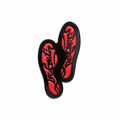 Red and black insole with brand logo on a white background